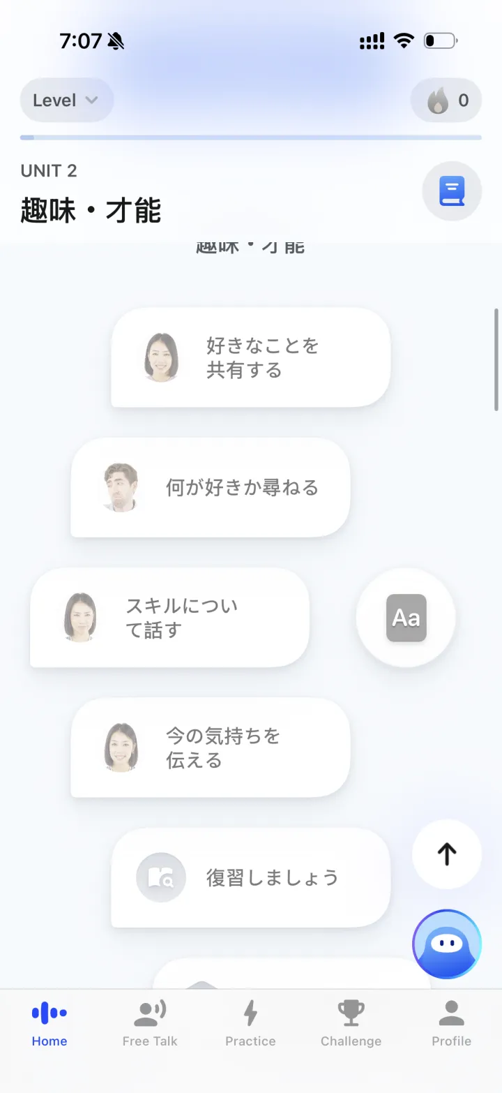 Die Speak-App zeigt Einheit 2 eines Japanischkurses – eine Liste von Konversationslektionen wie über Vorlieben sprechen oder über Fähigkeiten reden – mit einem Free-Talk-Tab in der Navigation